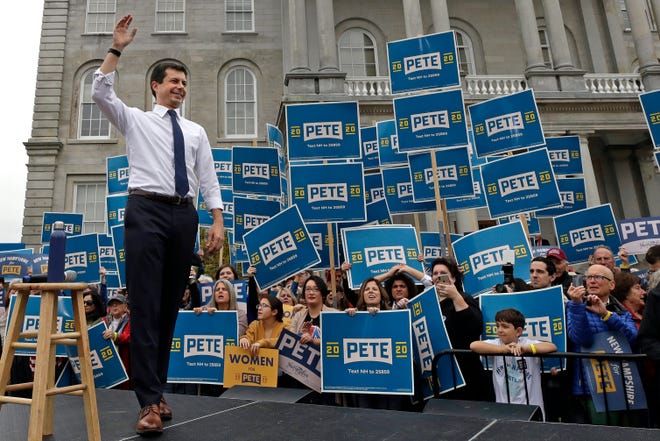 Democratic presidential candidate South Bend, Ind., Mayor Pete Buttigieg waves to supporters outside the Statehouse, Wednesday, Oct. 30, 2019, in Concord, N.H., after filing to be placed on the New Hampshire primary ballot.