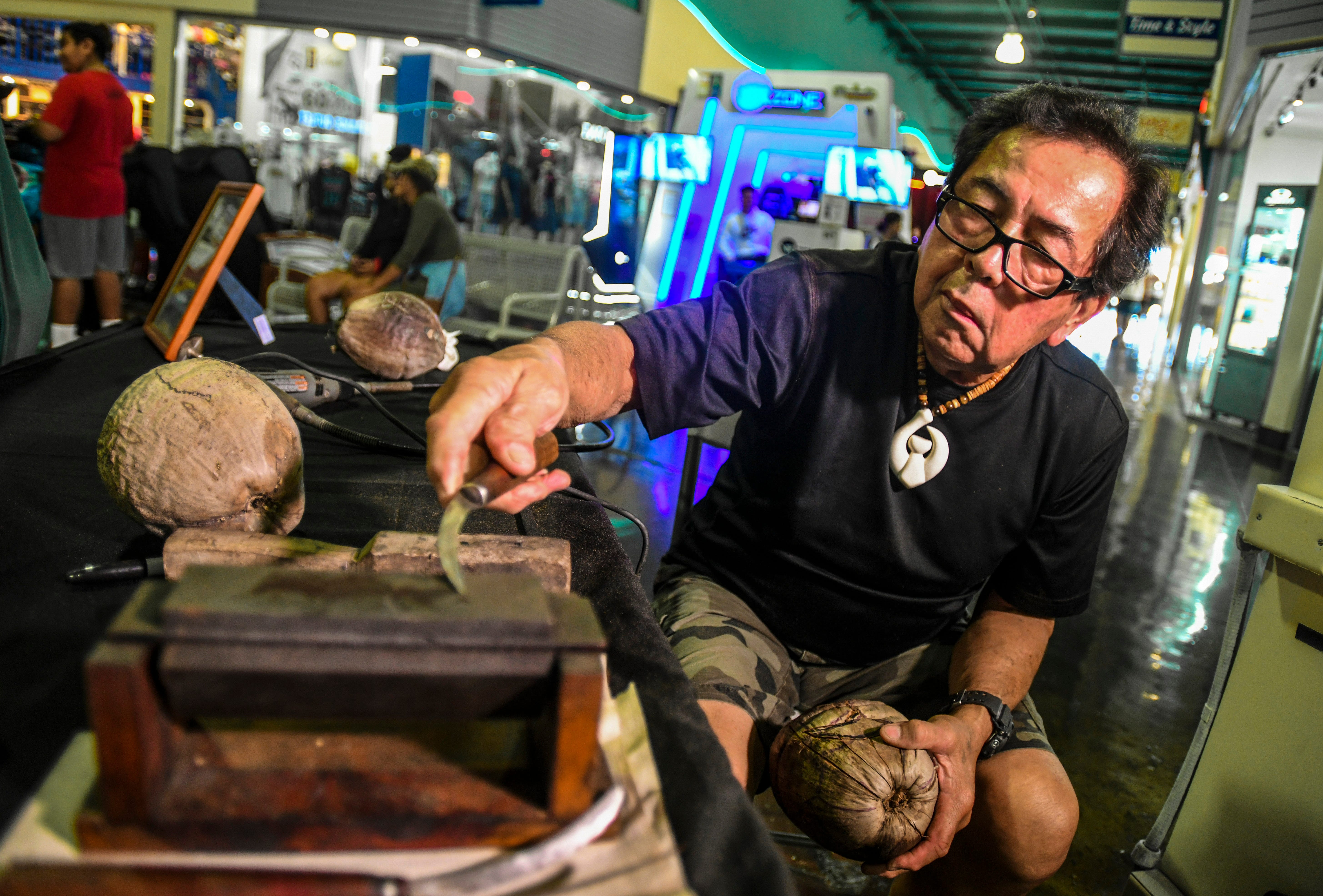 Master Carver Greg Pangelinan sharpens of of the many blades he uses in this March 30, 2019, file photo. Guam traditional and contemporary artists affected financially by the pandemic can apply for up to $5,000 in relief funds.