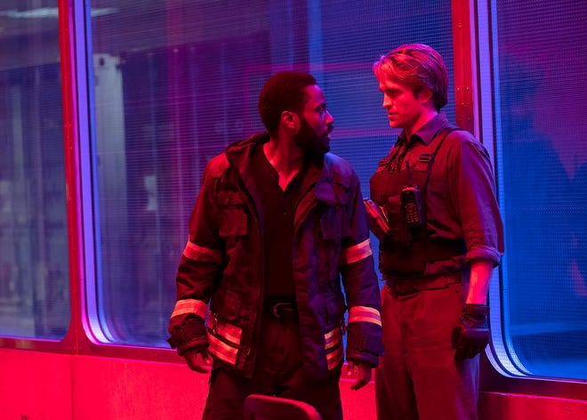 John David Washington (left, with Robert Pattinson) stars as the hero of Christopher Nolan's super-duper secret spy thriller "Tenet."
