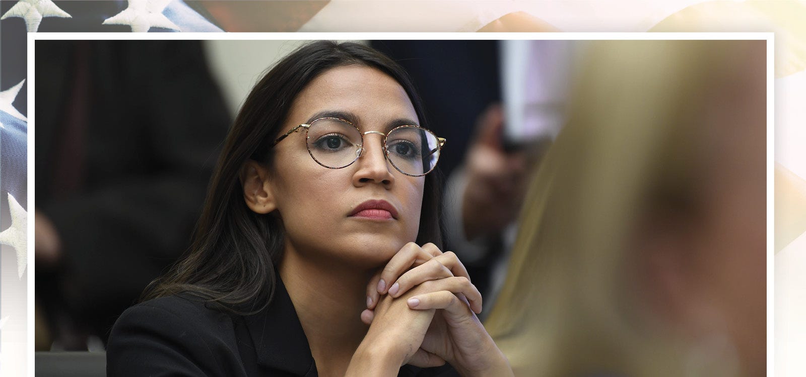 Rep. Alexandria Ocasio-Cortez, D-N.Y., listens as Facebook CEO Mark Zuckerberg testifies before the House Financial Services Committee in October.