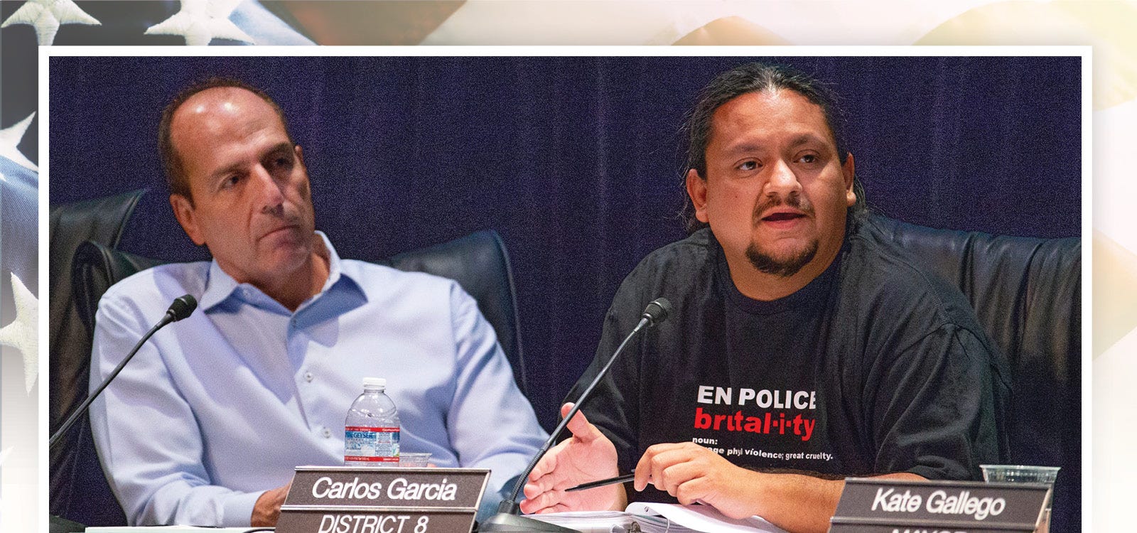 Councilman Carlos Garcia (right) makes a point as the Phoenix City Council conducts a meeting at the Orpheum Theatre in downtown Phoenix, July 2, 2019. Councilman Sal Dicicio listens (left).