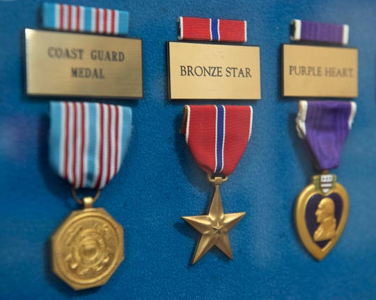 Jerry Holliman earned two Bronze Stars like this one, which hangs in a display showcasing various U.S. service medals at G. V. Sonny Montgomery VA Medical Center in Jackson, Miss. The Bronze Star Medal is a decoration awarded to members of the United States Armed Forces for either achievement, merit or valor in a combat zone.