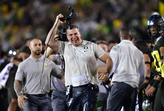 Oregon Ducks head coach Mario Cristobal celebrates after the Oregon Ducks defeated the Wisconsin Badgers during the 106th Rose Bowl game at Rose Bowl Stadium.