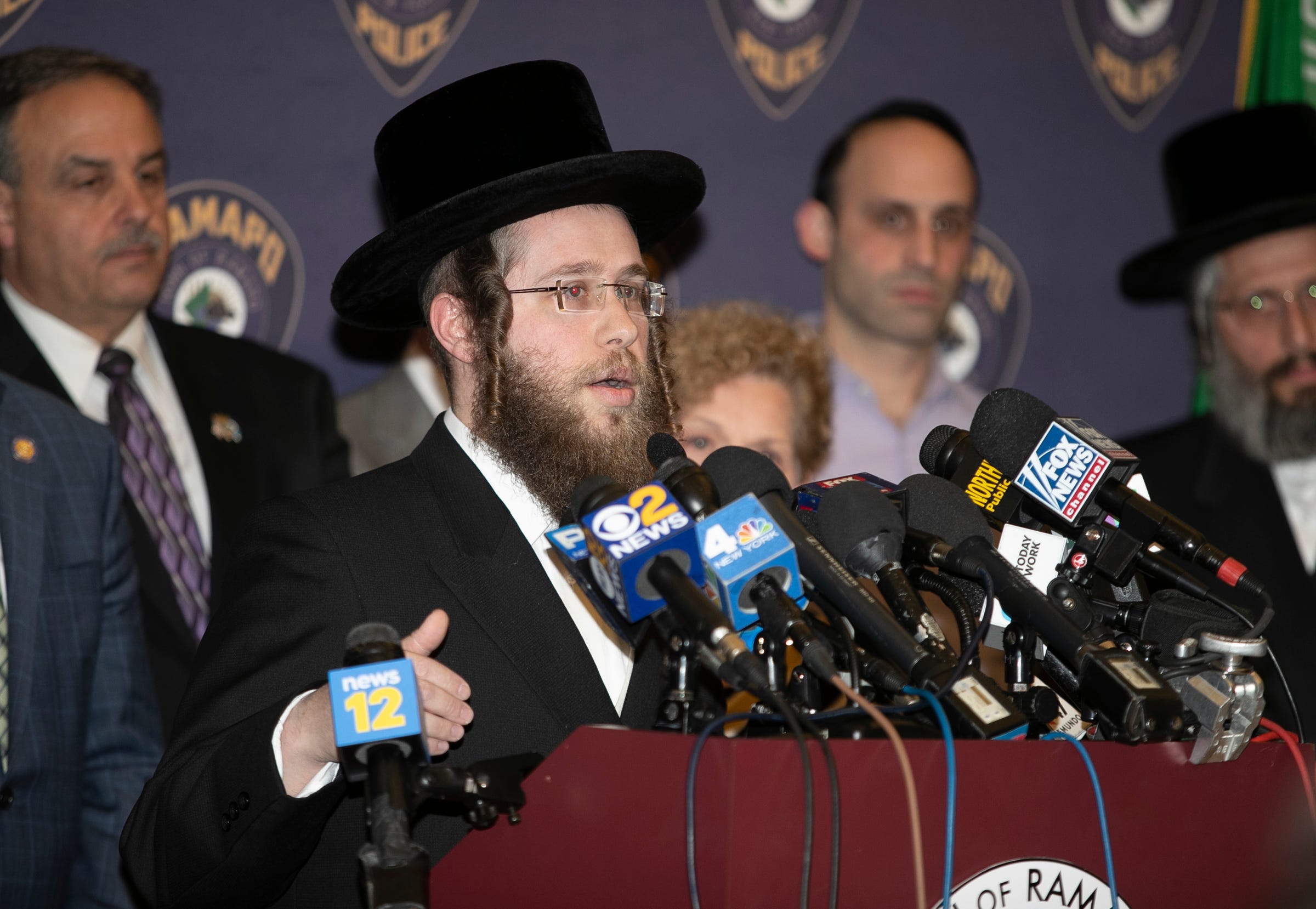 Rabbi Hersh Horowitz, executive director of the Ramapo Community Outreach Center, updates residents during a press conference at Ramapo Town Hall in Airmont on Thursday, January 2, 2020.