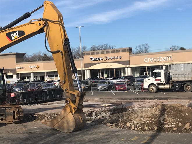 Work continued Jan. 2, 2020, to clear the former Michael's Tuxedos site and reconstruct the culvert for the stream that ran under the building to make way for a pair of new restaurants.