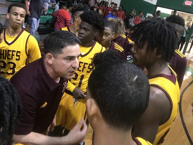 Natchitoches Central coach Micah Coleman exhorts his team during the 2019 Bossier High Invitational.