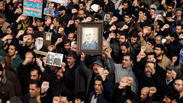 Thousands of Iranians take to the streets to mourn
