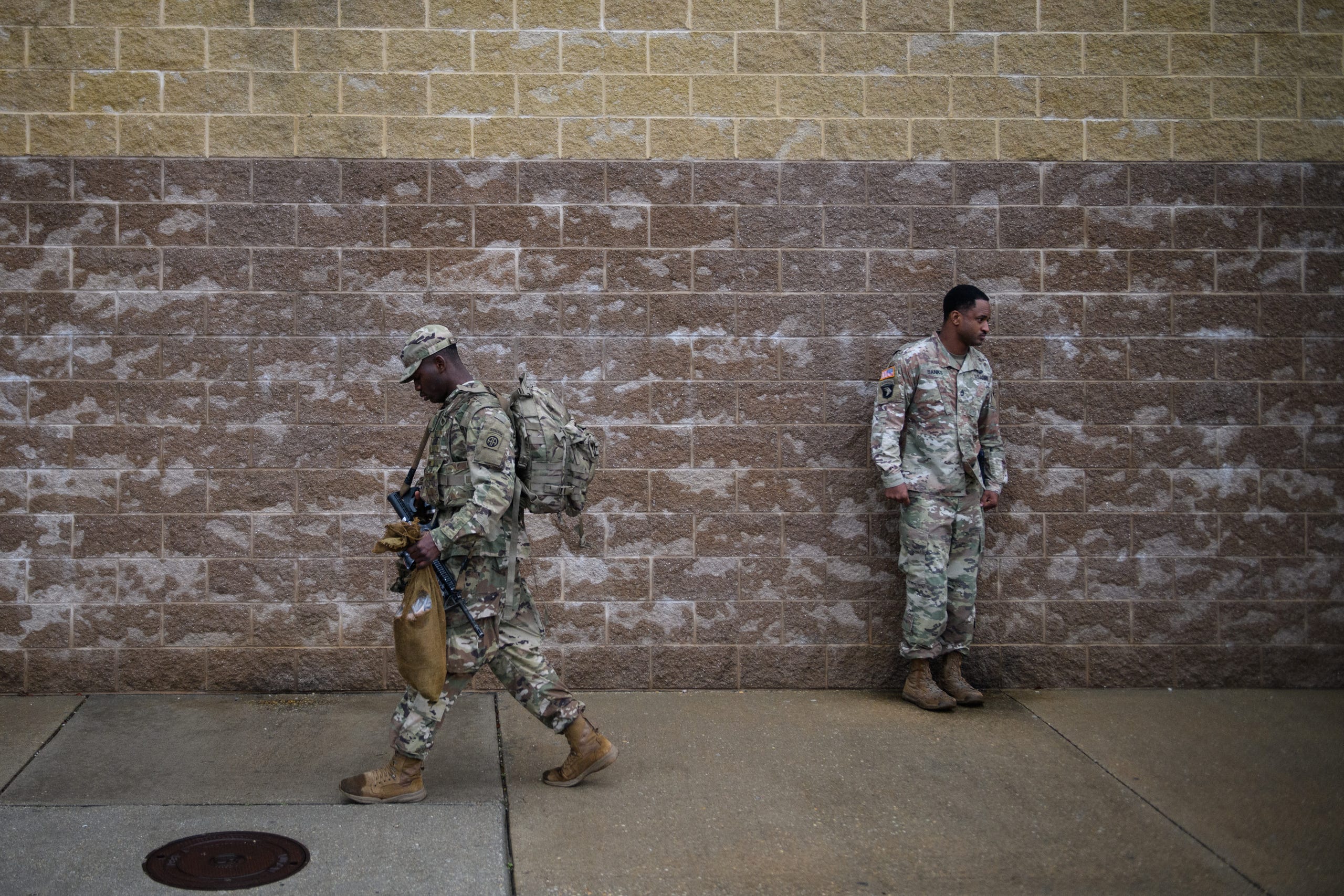 U.S. troops from the Army's 82nd Airborne Division arrive at Green Ramp as they head out for a deployment.
