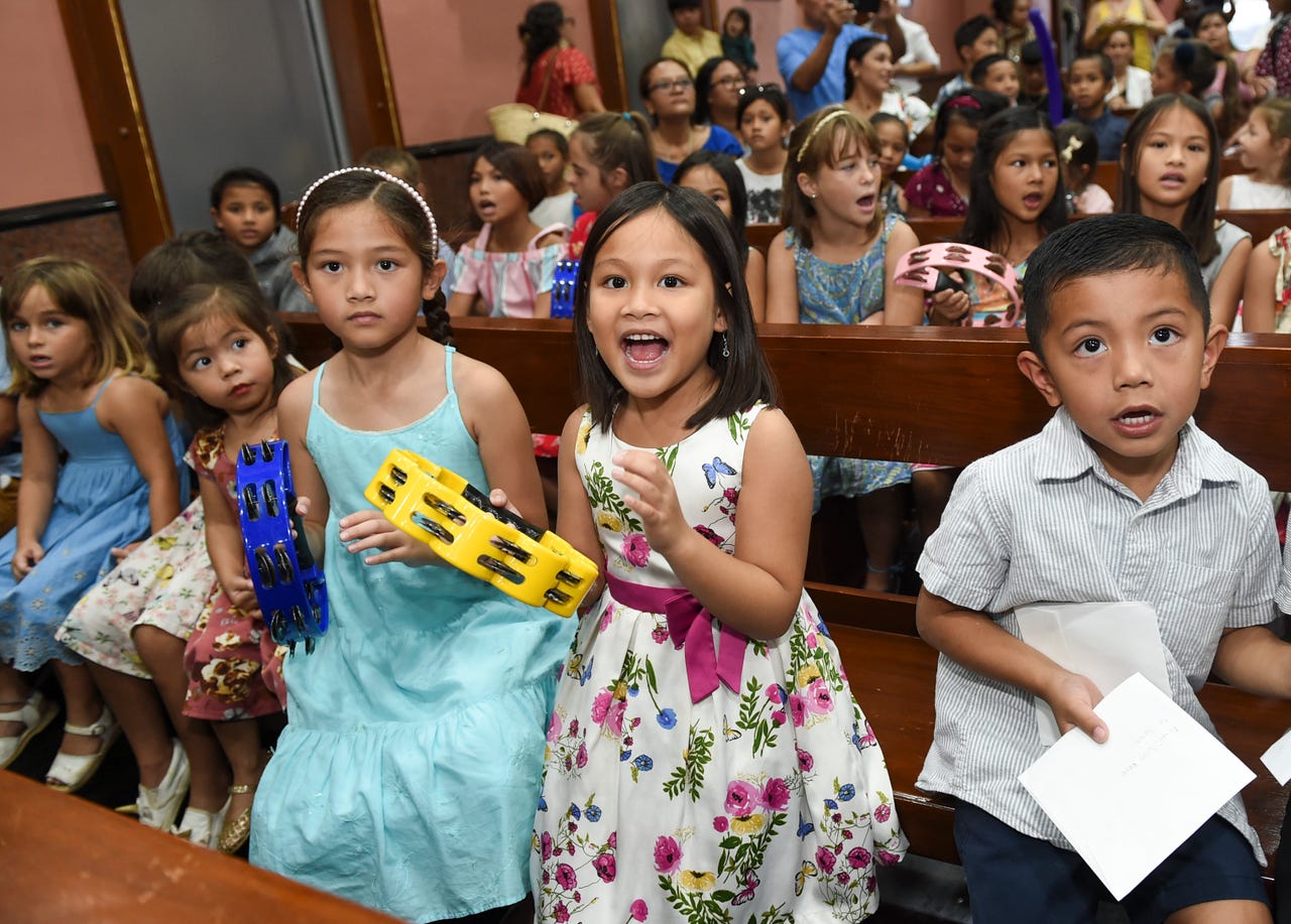 Children sing songs in celebration of the Three Kings at the St. Therese Chapel in Hagåtña, Jan. 5, 2019. 