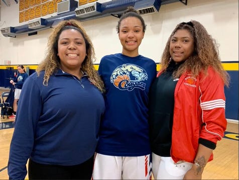 Dec. 28, 2019; (L to R) Sahuaro girls basketball assistant coach Olivia Harden, forward Alyssa Brown, and assistant coach Sydney Brown stand as sisters celebrating her setting the school scoring record at Flowing Wells Shootout.