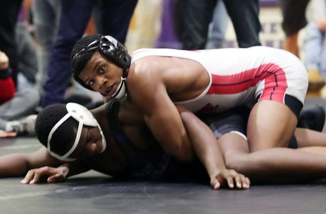 Fox Lane's Quincy Downes on his way to defeating New Rochelle's Steven Burrell in the 170-pound weight class during the Shoreline Wrestling Tournament championship at New Rochelle High School Jan. 4, 2020.