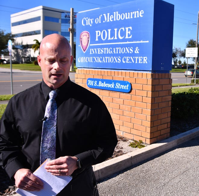 Melbourne Police Lt. Shawn Eising gives an update on the Melbourne homicide investigation, standing at the Melbourne Police  Dept. Investigations and Commuications Center in Melbourne. 
