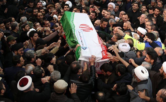 Mourners in Tehran carry the casket of slain top Iranian military commander Qasem Soleimani, on Jan. 6, 2020, after he was killed in a U.S. strike in Baghdad last week.