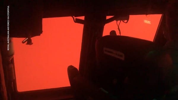 Pilots fly through blood-red skies, heavy smoke co