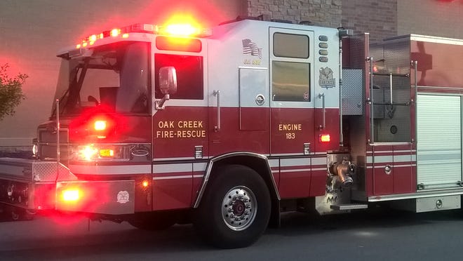 One person was found dead in a motel room in Oak Creek after a fire broke out in an attached residence.