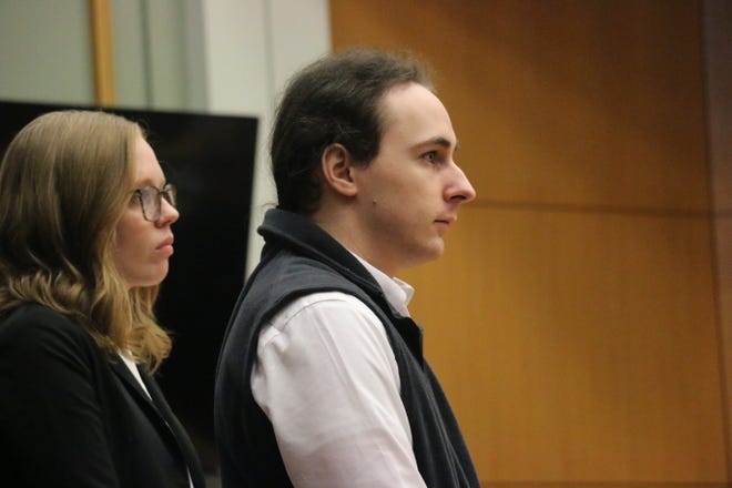 Defendant Jonathon Kyle Elliott and his attorney Shyanee Riddle stand together in a Williamson County courtroom on Jan. 7, 2020.
