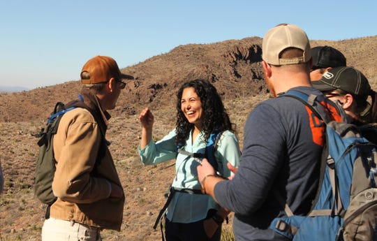 U.S. Rep. Xochitl Torres Small, D-NM, at center, participated in a group hike on the Achenbach Canyon trail in the Organ Mountains-Desert Peaks national monument on Sunday, Jan. 5, 2020.
