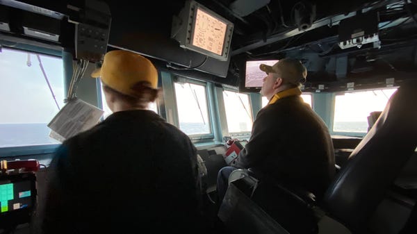 Jason N. Lester, right, USS Farragut's commander a