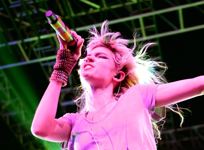 Singer Grimes said on Instagram Tuesday that she's struggling to balance work with being 25 weeks pregnant.