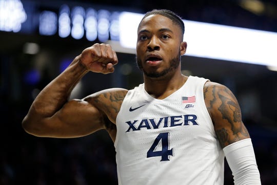 Xavier Musketeers forward Tyrique Jones (4) flexes after drawing an and-1 in the first half of the NCAA Big East conference game between the Xavier Musketeers and the Seton Hall Pirates at the Cintas Center in Cincinnati on Wednesday, Jan. 8, 2020. Seton Hall led 40-32 at halftime.