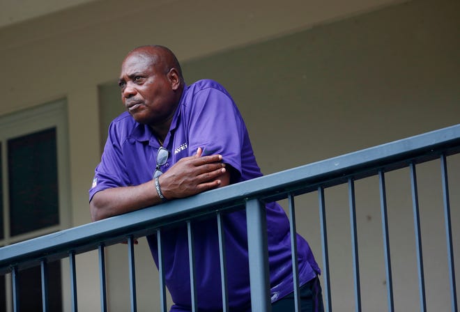 In this July 28, 2017, file photo, Baltimore Ravens general manager and executive vice president Ozzie Newsome looks out over practice fields following an NFL football training camp practice, in Owings Mills, Md.