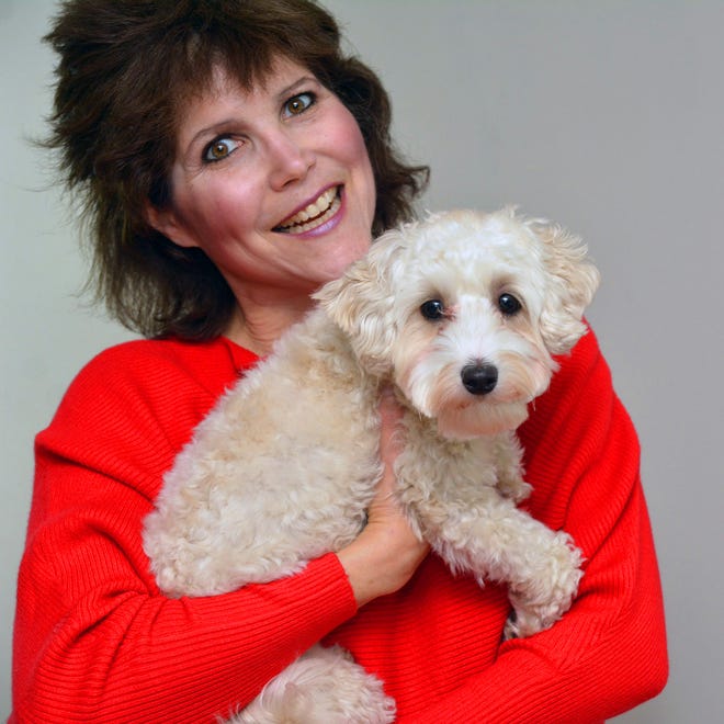Lisa Desatnik with her dog, Dawson.