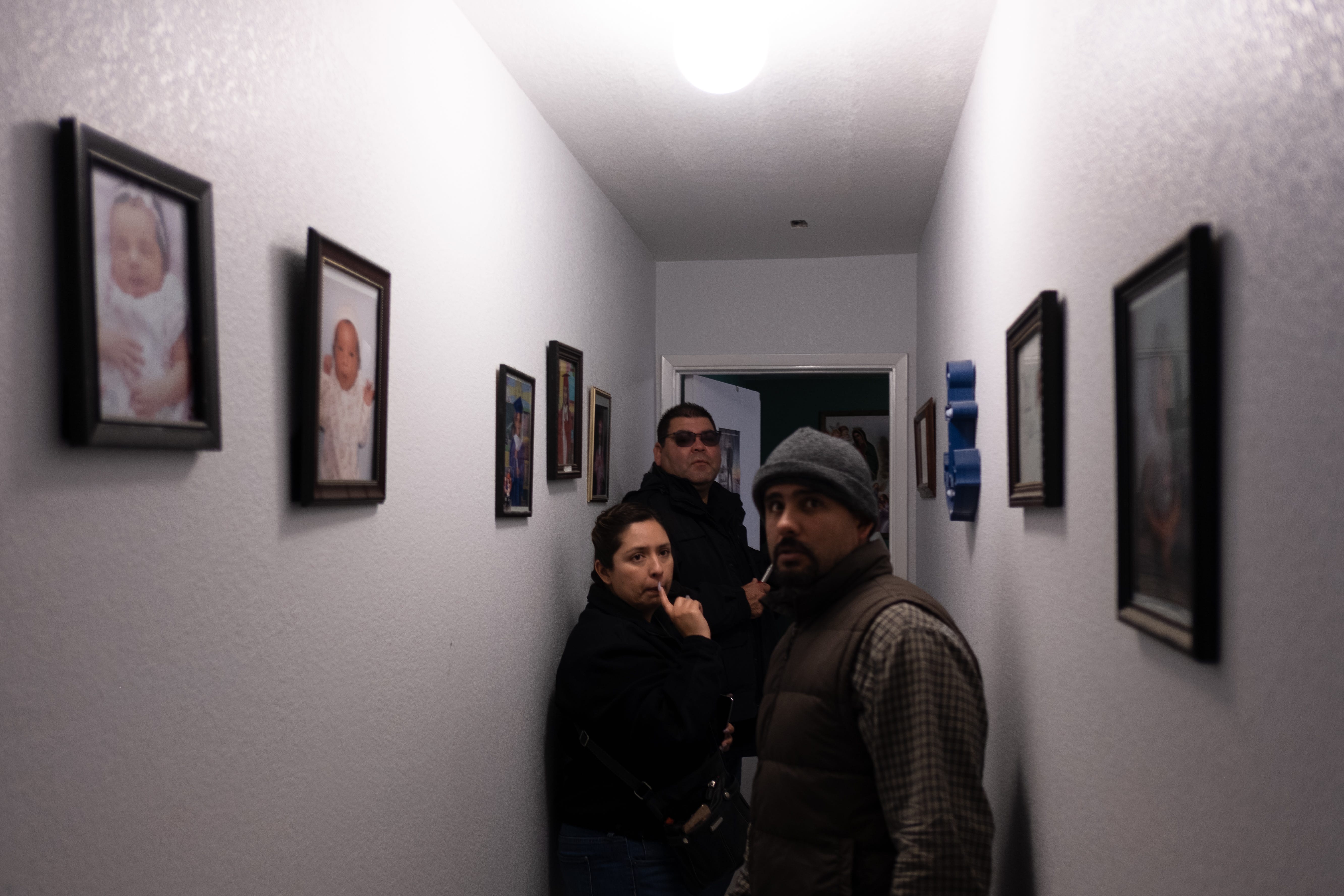 Code enforcement officers Cindy Guerrero and Lorenzo Salazar inspect the home of Cuahtemoc Becerra on the North Side of Salinas.