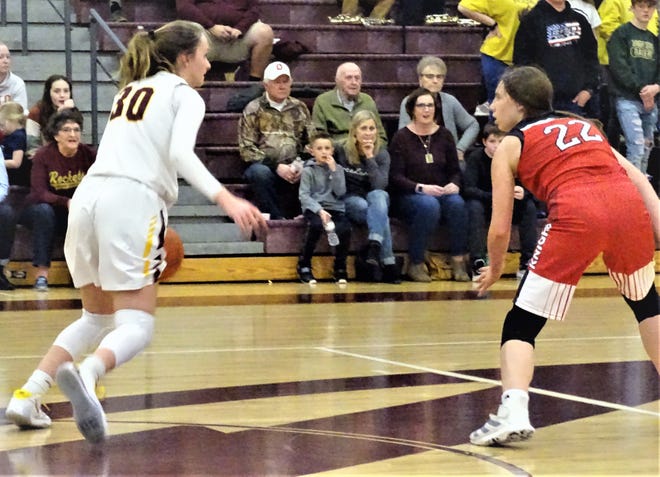 Berne Union's Bella Kline brings the ball up the court against Fairfield Union's Kennedy Couch during Friday's Mid-State League-Cardinal Division game. The Rockets won, 46-35.