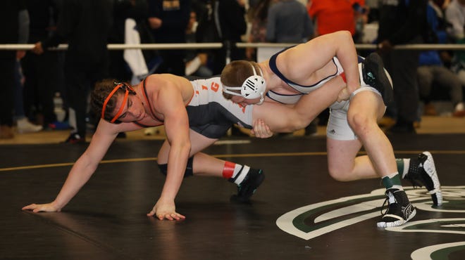 Sebastian Garabaldi from White Plains, left, in action during his 220 pound final match at the final day of the Eastern States Classic wrestling tournament at Sullivan County Community College in Lock Sheldrake, Jan. 11, 2020.