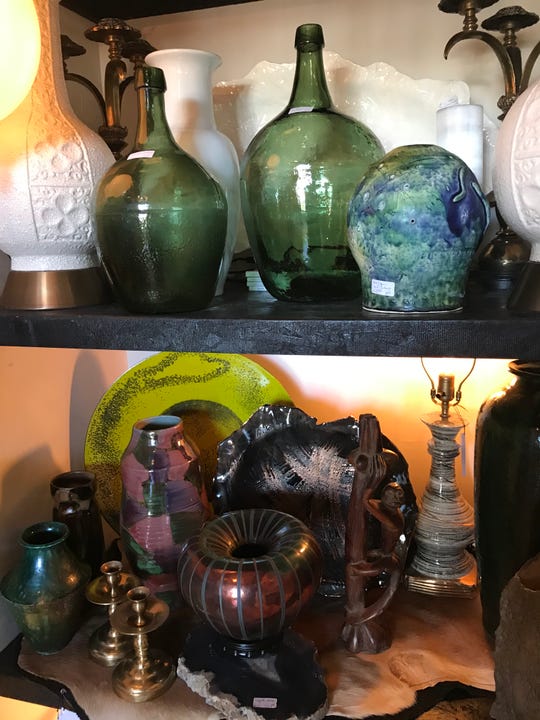 Colored glassware of all shapes and sizes remains a designer staple in 2020 antique trends.
