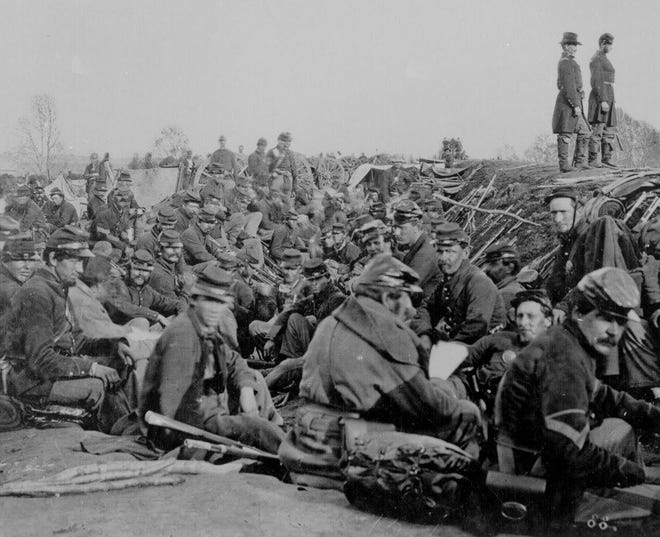 Soldiers are pictured in the trenches during the Civil War.