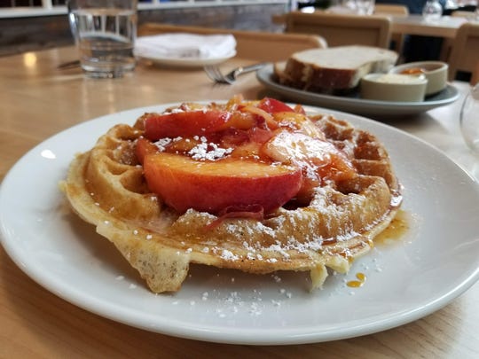If you're visiting Seattle, make sure to try Sourdough Waffles With Fruit from the chef's farm.