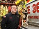 Tyler Van Leer of the Millville Fire Department and Hansel pose for a photo on Tuesday. Hansel will be the first pit bull in the United States certified in arson detection, according to Throw Away Dogs Project.