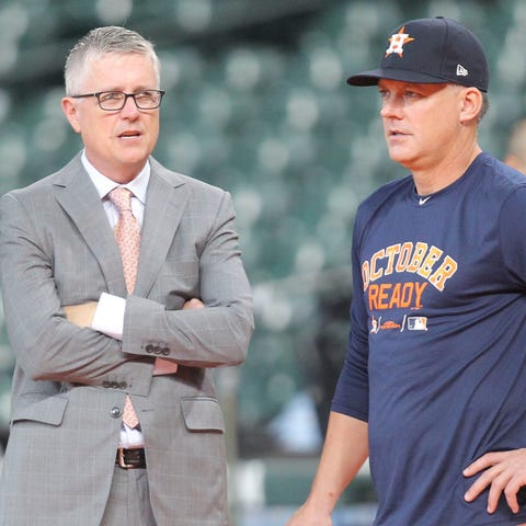 GM Jeff Luhnow (left) and manager A.J. Hinch have 