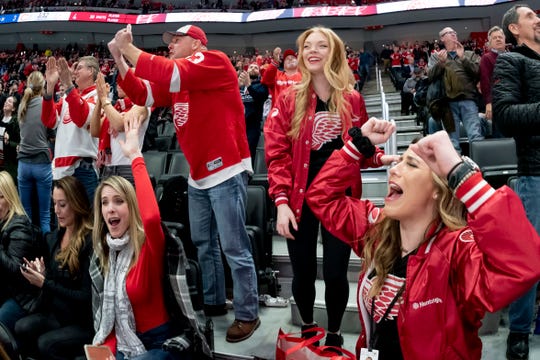 Red Wings fans cheer after Filip Zadina scores the winning goal against Montreal on Jan. 7 at Little Caesars Arena.