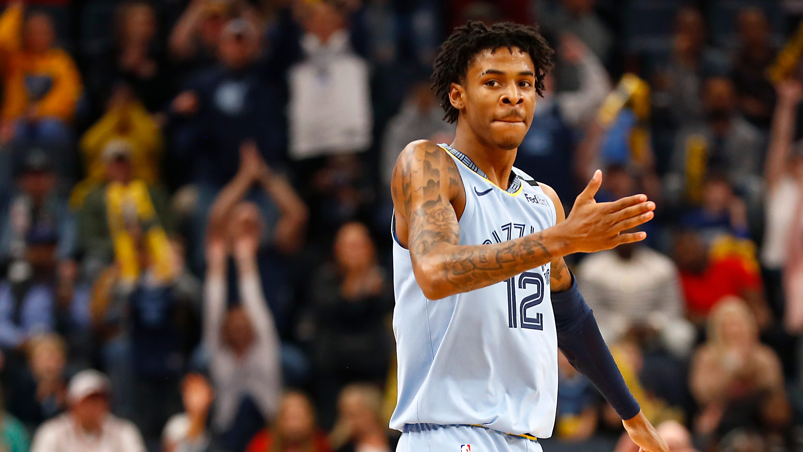 Grizzlies' Ja Morant meets baby giraffe 'Ja Raffe' at ...