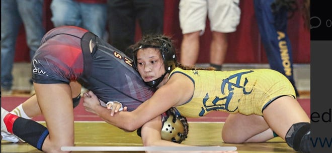 Everett Alvarez wrestler Kaelyn Siason took home first in her weight class at the inaugural PCAL girls' wrestling tournament.