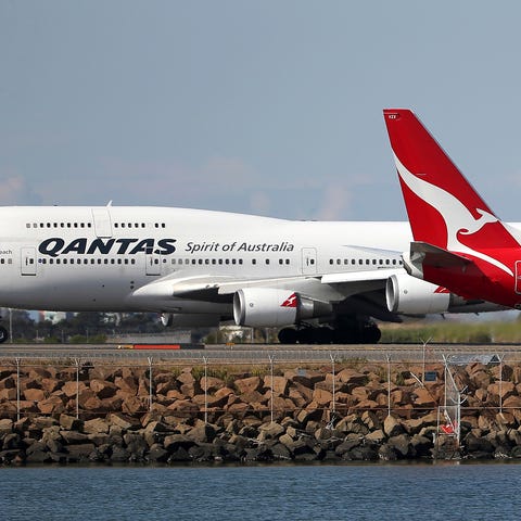 A Qantas passenger says negligence on the part of 