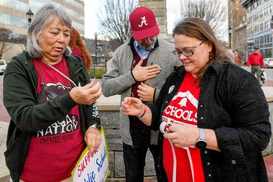 Area teachers, parents and students participated in the “Our Schools Deserve Funds Now” protest at Vance Memorial in downtown Asheville January 15, 2020. The rally was organized by the Asheville Association of Educators.