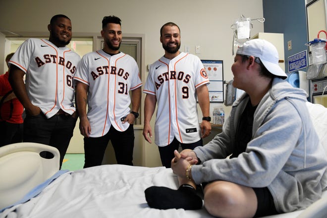 The Houston Astros' Rogelio Armenteros, Abraham Toro and Jack Mayfield visit Rodrigo Castro Torres at Driscoll Children's Hospital, Thursday, Jan. 16, 2020. This is one of the stops for the annual Astros Caravan. 
