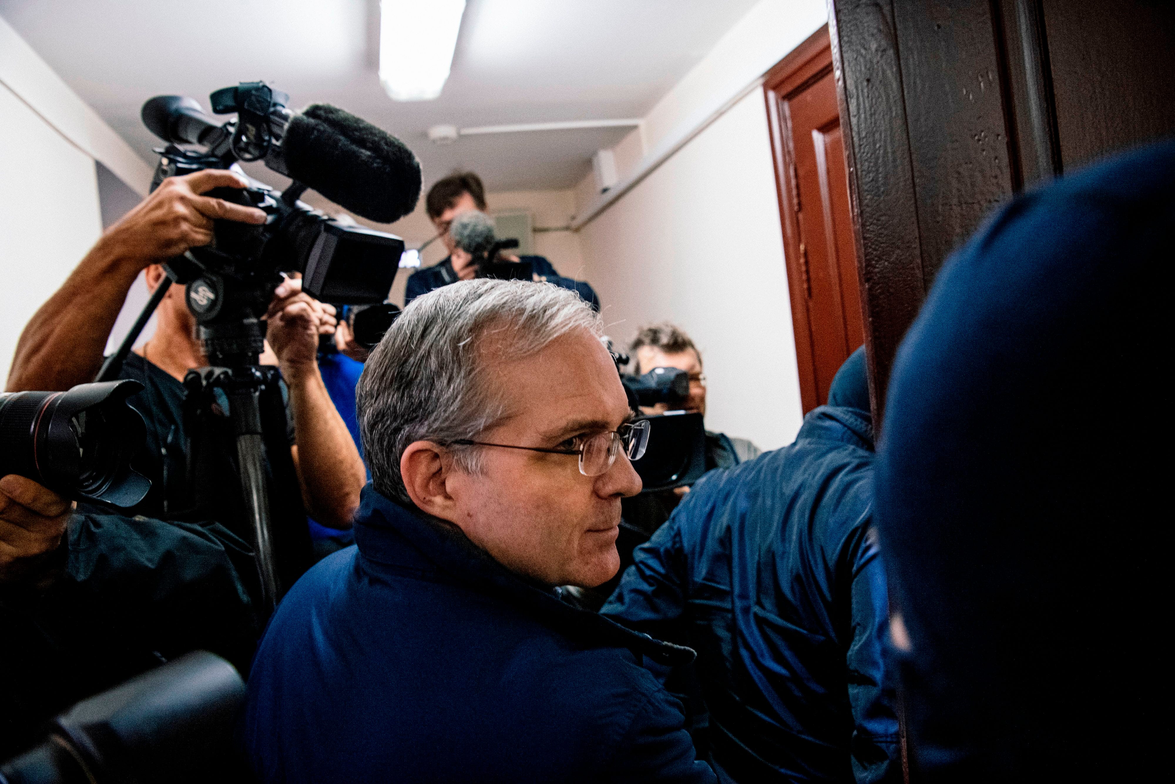 Paul Whelan, a former US Marine accused of espionage and arrested in Russia in December 2018, is escorted for a hearing to decide to extend his detention at the Lefortovo Court in Moscow on October 24, 2019.