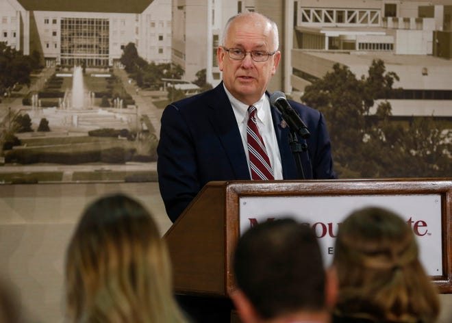 Missouri State University President Clif Smart introduces new head football coach Bobby Petrino during a press conference at JQH Arena on Thursday, Jan. 16, 2020.