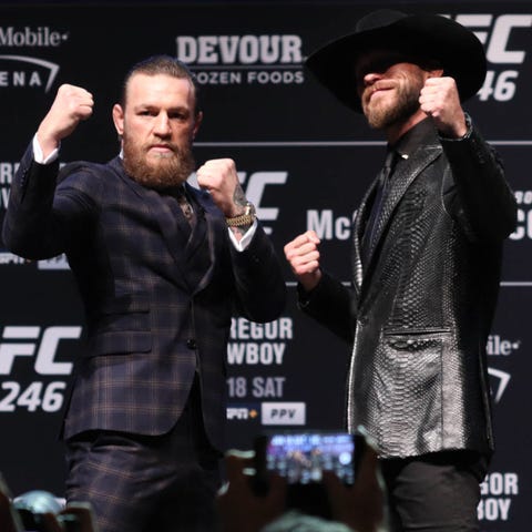 Conor McGregor, left, and Donald "Cowboy" Cerrone 