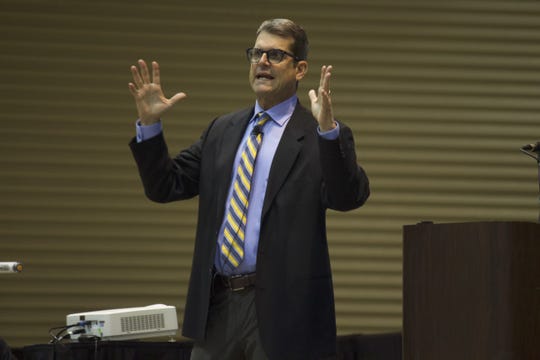 Jim Harbaugh at a coaching clinic in Lansing, Jan. 16, 2020.