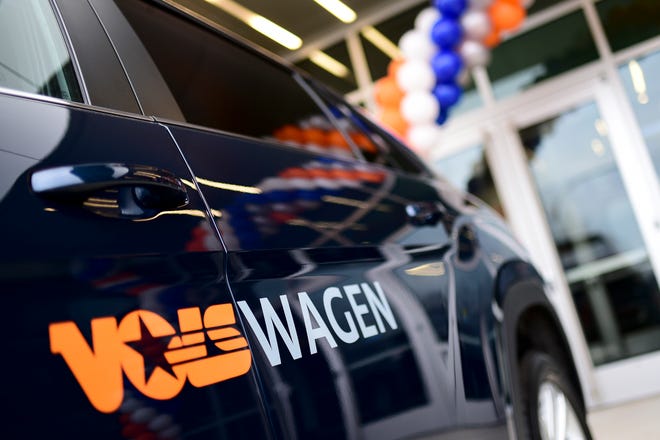 A Volkswagen is parked in front of a ceremony announcing a research partnership between the University of Tennessee and Volkswagen at Cherokee Farms in Knoxville on Jan.  17, 2020. UT, Volkswagen and Oak Ridge National Laboratory will work together to research light vehicles.  components and develop electric vehicles.