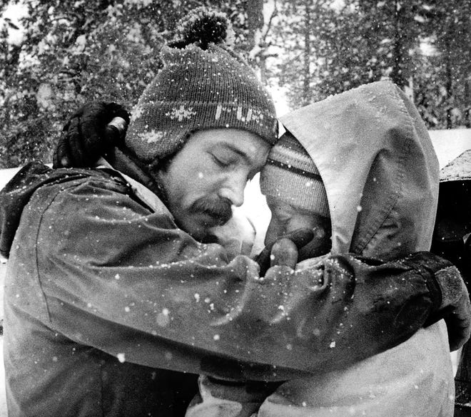 Bill Davie and Jackie Meyer cosole each other after learing their friend Jake Smith had been killed during an avalanche at Alpine Meadows in 1982.