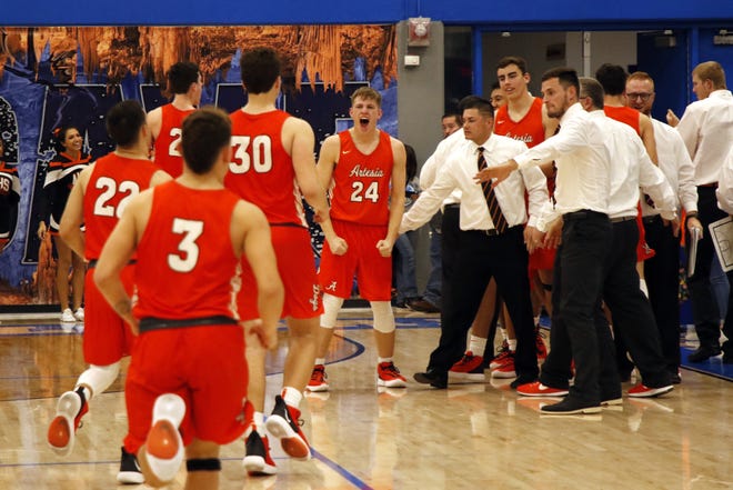 Artesia's Jacob Creighton (24) reacts after the final buzzer in Friday's game against Carlsbad. Artesia beat Carlsbad in overtime, 57-51, denying Carlsbad a season sweep.