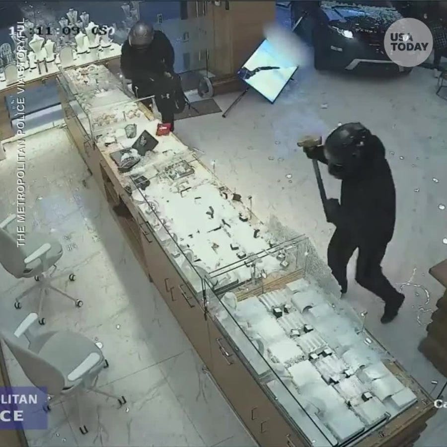 Thieves drive a Range Rover into a jewelry store for a smash and grab robbery
