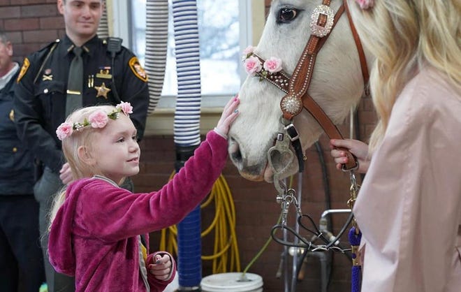 An 8-year-old Butler County girl battling brain cancer got a surprise Saturday,