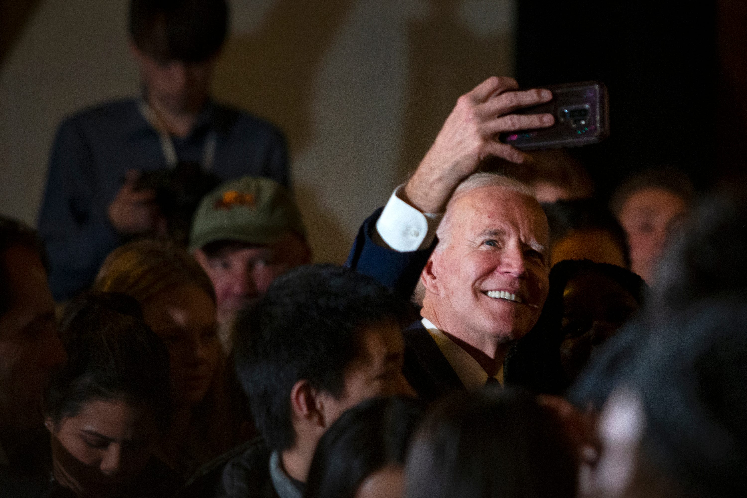3:52 p.m. — Former Vice President Joe Biden takes selfies with spectators following his campaign event on Jan. 18, 2020 at Simpson College's Pfeiffer Hall.